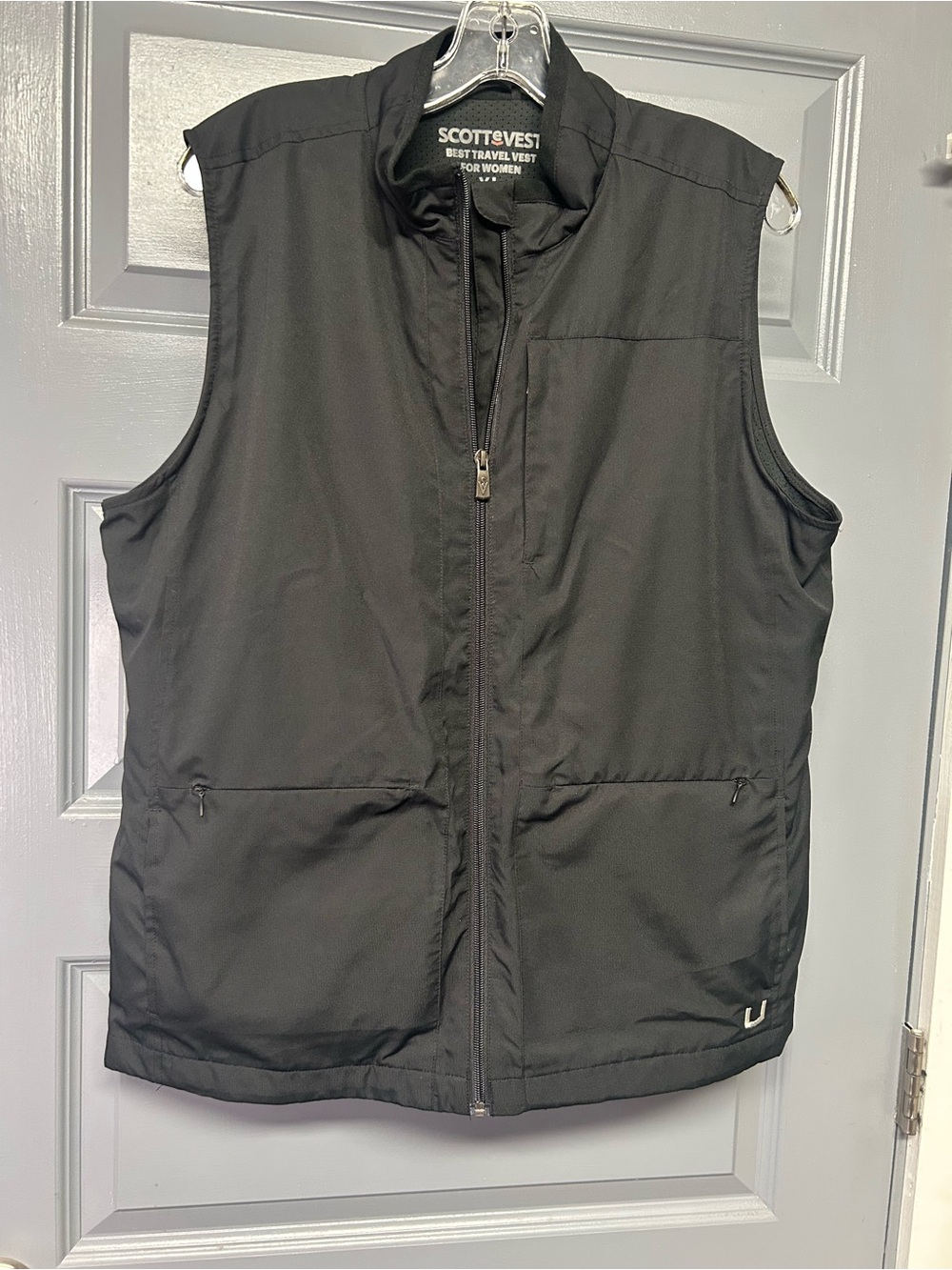 SCOTTEVEST women’s travel vest. Black size XL. As is pockets galore